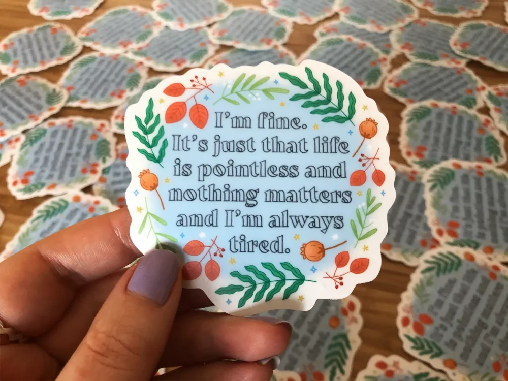 Sticker with a quote from Andy Dwyer surrounded with florals