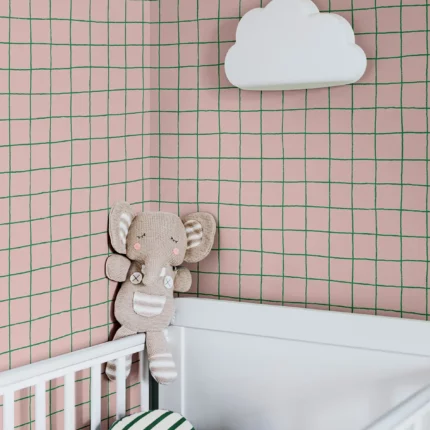 Pink grid pattern as wallpaper in a nursery