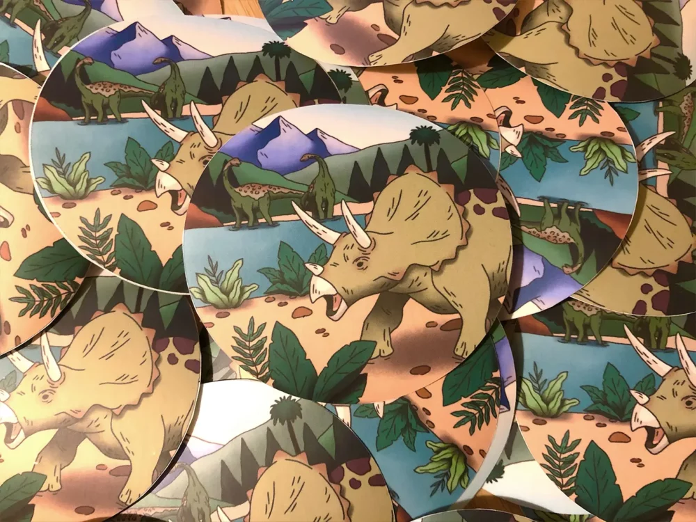 Multiple extinction scene sticker featuring a triceratops