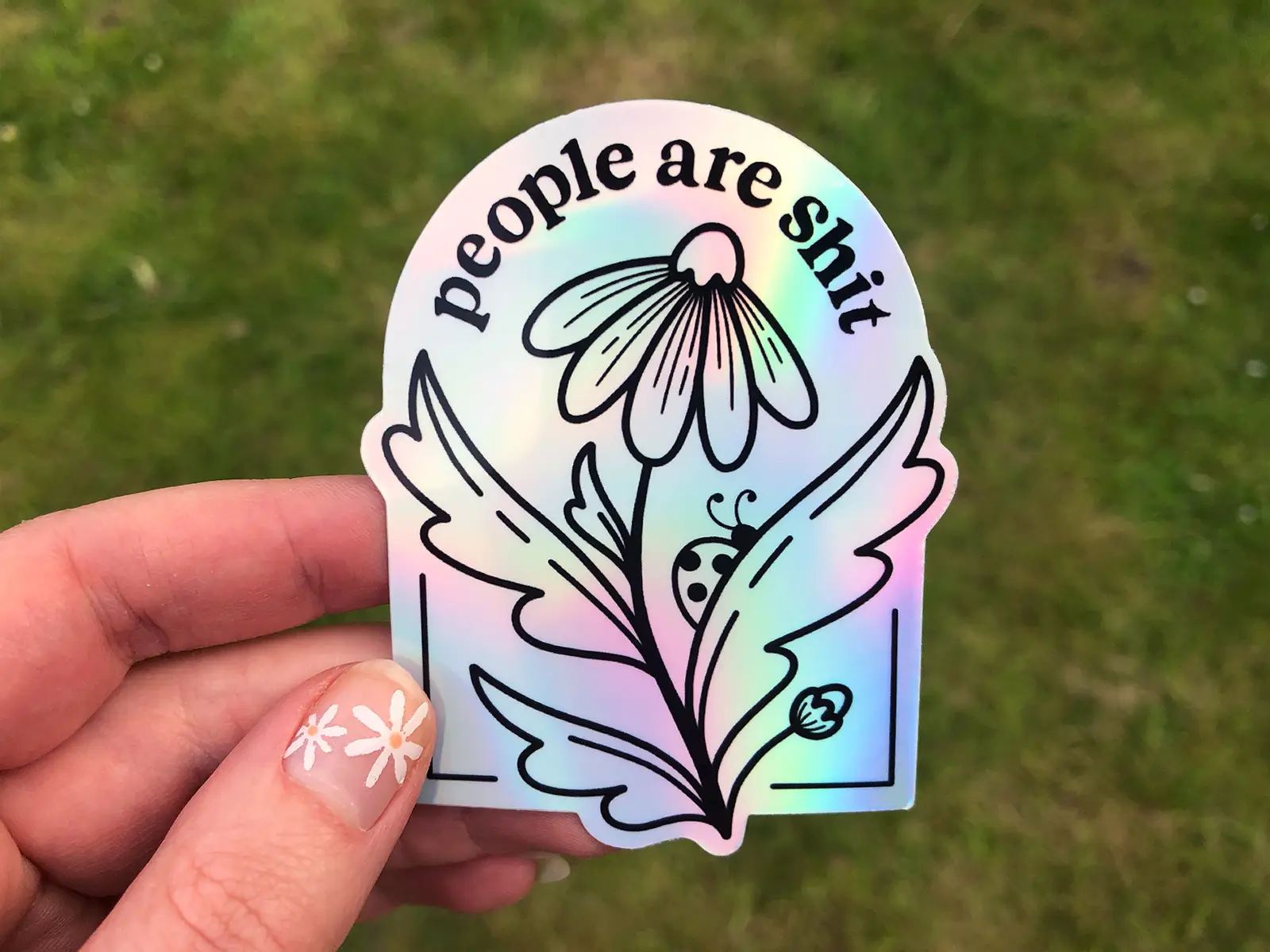 People are shit holographic sticker with a floral design