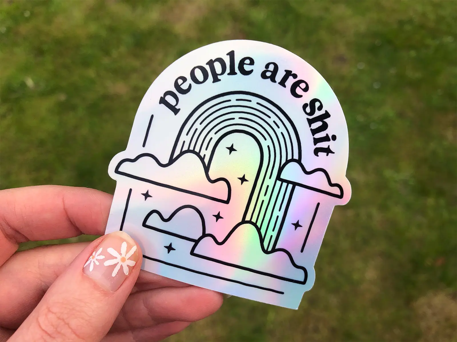 People are shit holographic sticker with a rainbow design