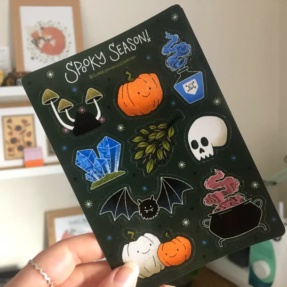 Spooky season sticker sheet includes 9 halloween themed stickers on a transparent gloss