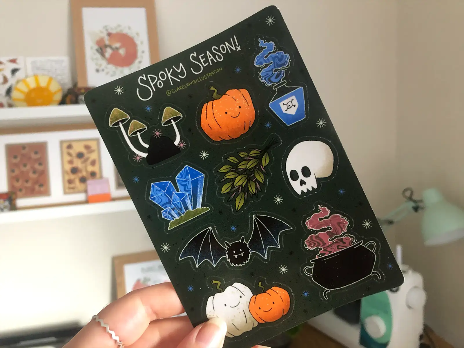 Spooky season sticker sheet includes 9 halloween themed stickers on a transparent gloss